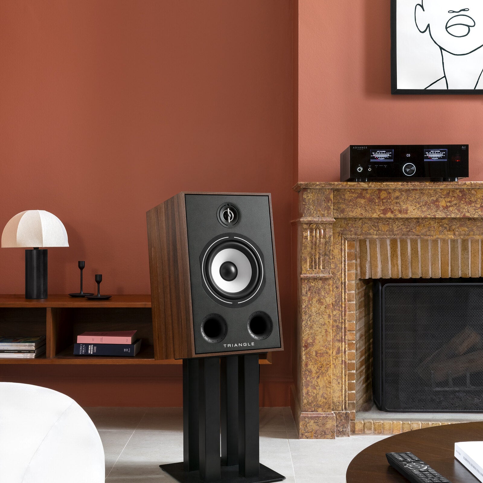 Triangle - S03 - Speaker Stands Australia Black, with a Borea BR05 in Chestnut (sold separately) in a living room